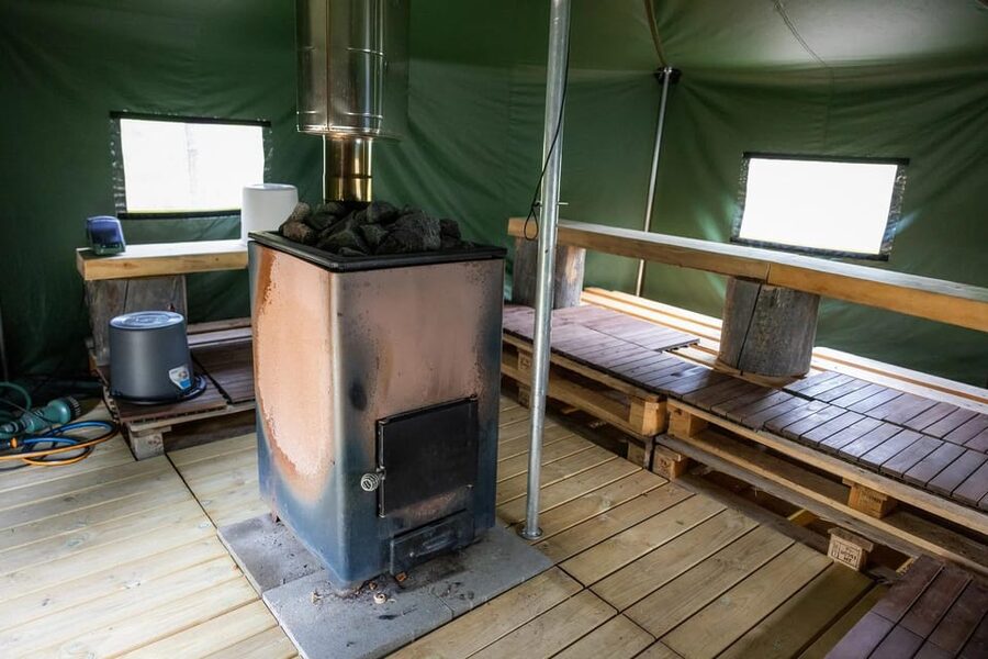 Arctic Tent Sauna Experience with Ice Swimming - Reaching Rahajärvi camp from Ivalo