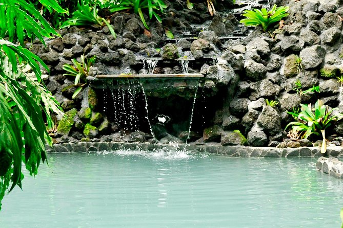 Arenal Volcano Combination Tour: Zipline, Tubing and Hot Springs - Tubing the Arenal River rapids