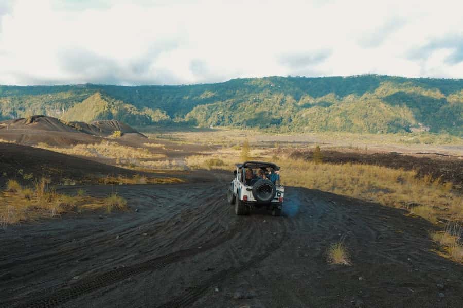 Bali: Day/Sunset Mount Batur 4WD Jeep and Natural Hot Spring - The 4WD ride across Mount Batur’s black lava