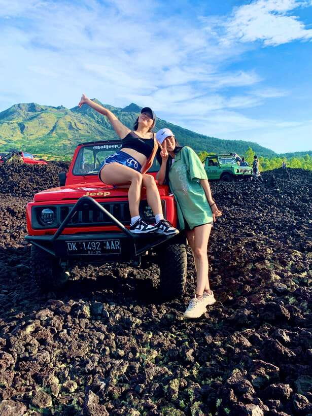 Bali: Sunset Mount Batur Jeep and Hot Spring All Inclusive - Bouncing across the 1963 black lava field