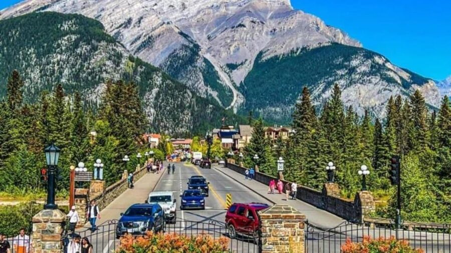Banff: Gondola, Hot Springs, Bow falls & Three lakes tour - Banff Avenue, Bow Falls, and Surprise Corner