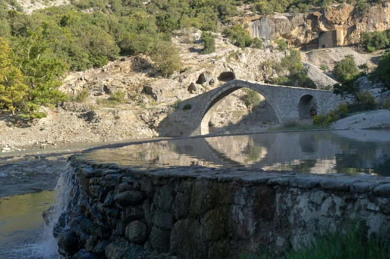 Day Tour to Permet Thermal Baths and Langarica Canyon - Benja Thermal Baths beneath Ura e Kadiut