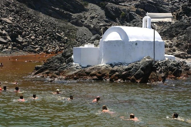 Early Season Experience: 3-hours Santorini Volcano and Hot Springs Trip - Riding Down to Fira’s Old Port