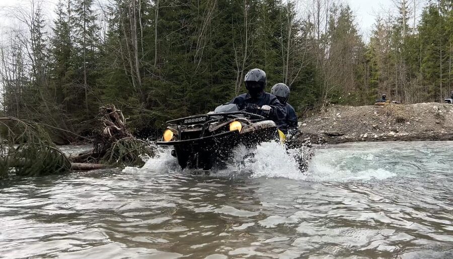 From Krakow: ATV/Snowmobile Ride, Shooting & Hot Springs - Getting muddy on the Can-Am quads