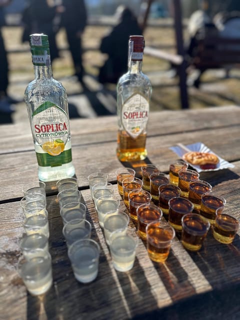 From Krakow: Zakopane Tour with Thermal Spa & Hotel Pickup - Smoked cheese, vodka, and a shepherd’s hut in Witów