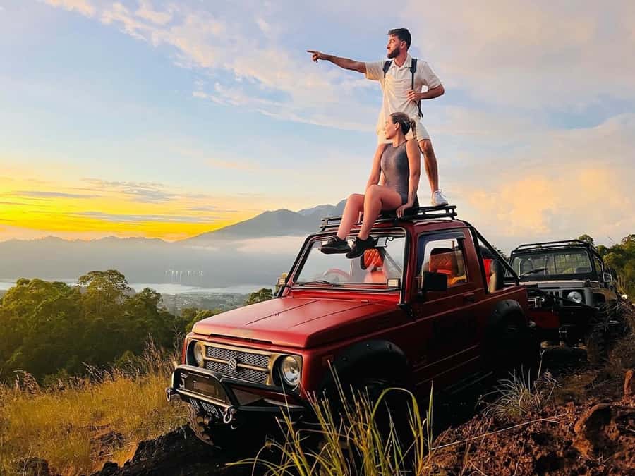 From Ubud: Mount Batur Shared Jeep Sunrise & Hot Spring Tour - Sunrise views over Lake Batur