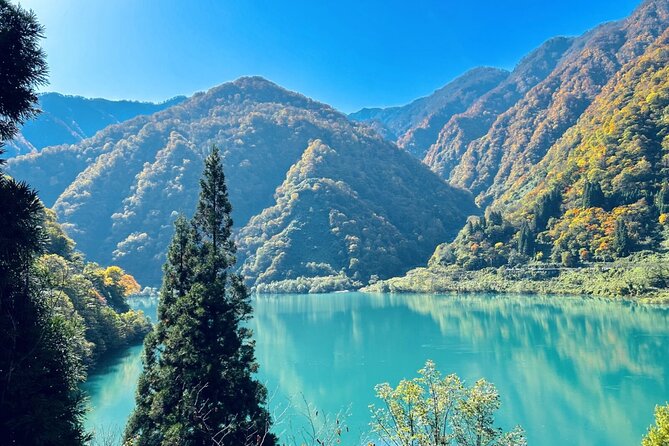 Full Day Tour to Kurobe Gorge and Unazuki Onsen from Kanazawa - Bridges, Buddhas, and Onsen Water
