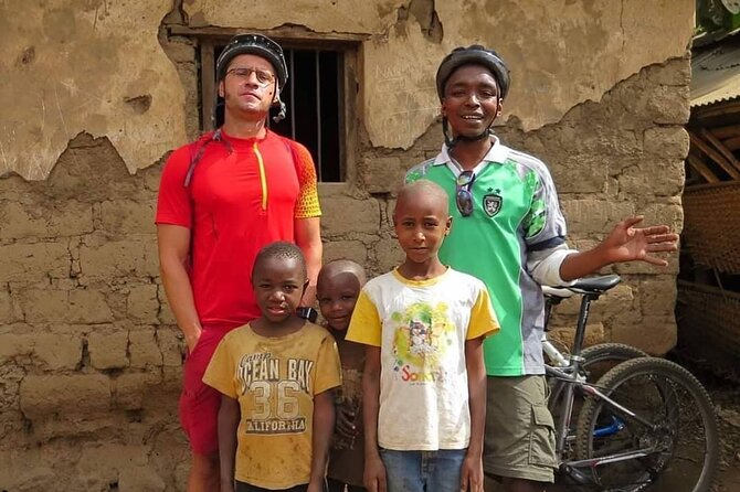 Kikuletwa Chemka Hot Springs Bicycle or Tuk Tuk Day Trip - Riding through villages, farms, and baobab country