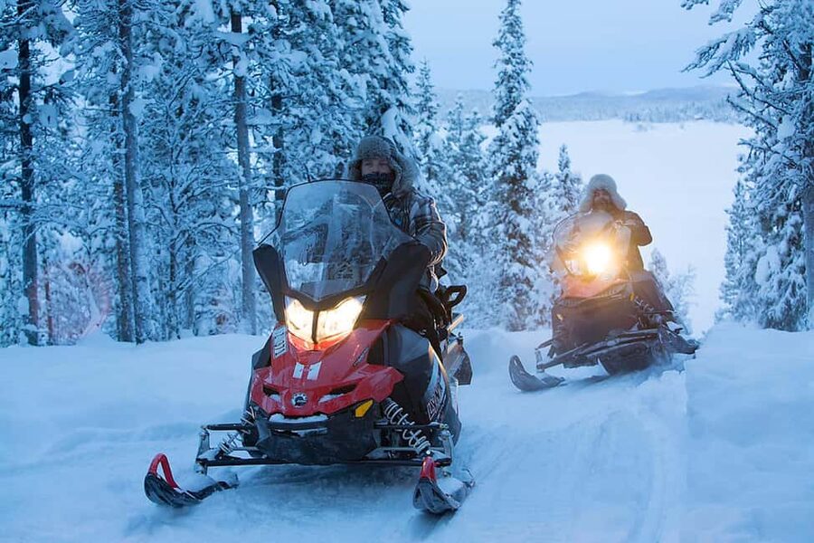 Kiruna: Overnight Snowmobile Tour with Dinner and Sauna - Riding the Torne River and forest trails