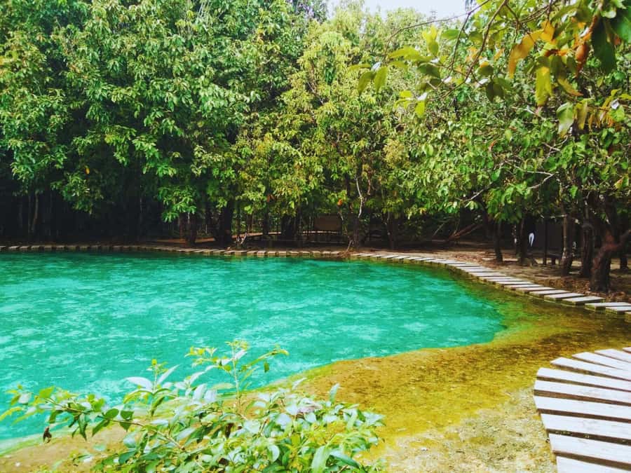 Ko Lanta: Full Day Emerald Pool&Hot Spring With Tiger Temple - Soaking at the hot spring waterfall