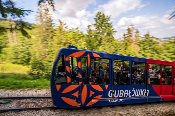 Krakow Zakopane Cable Car Vodka Cheese and Hot Springs Tour - Transport, group size, and the ten-hour schedule