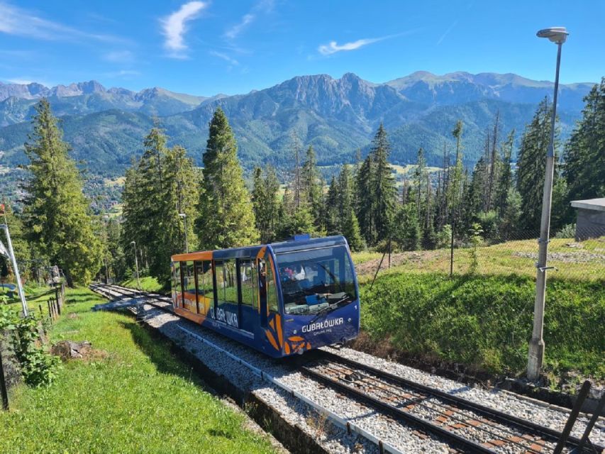 Krakow: Zakopane, Gubałówka & Thermal Baths – Full-Day Tour - Oscypek cheese, spirits, and a taste of Podhale