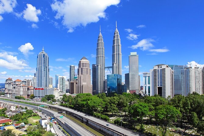 Kuala Lumpur City Tour plus Batu Caves, Hot Springs & Waterfalls - Thean Hou Temple and the National Monument