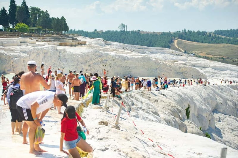 Kusadasi: Pamukkale Hot Spring & Hierapolis Small-Group Tour - Walking the white Pamukkale terraces