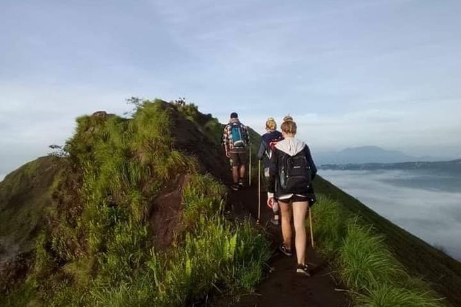 Mount Batur Sunrise Trek with Natural Hot Spring - All Inclusive - Starting through gardens and into the dark