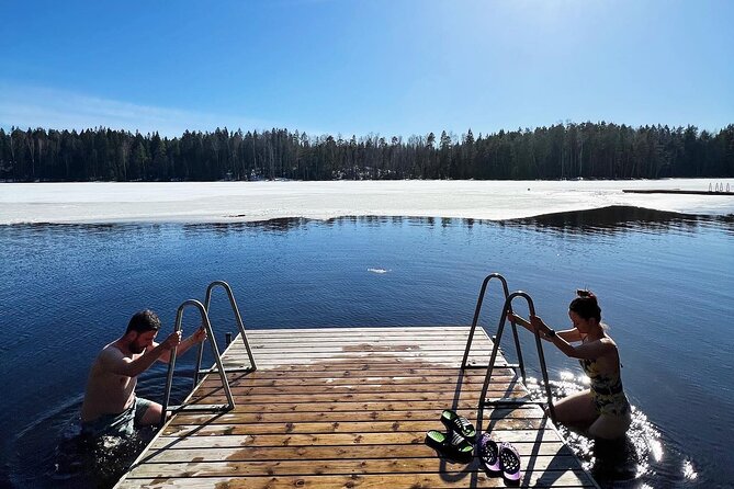 National Park Hike & Finnish Smoke Sauna Experience with Campfire Lunch - Campfire lunch beside the lake