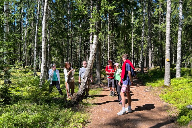 National Park Hike & Finnish Smoke Sauna Experience with Campfire Lunch - The guides shape the day