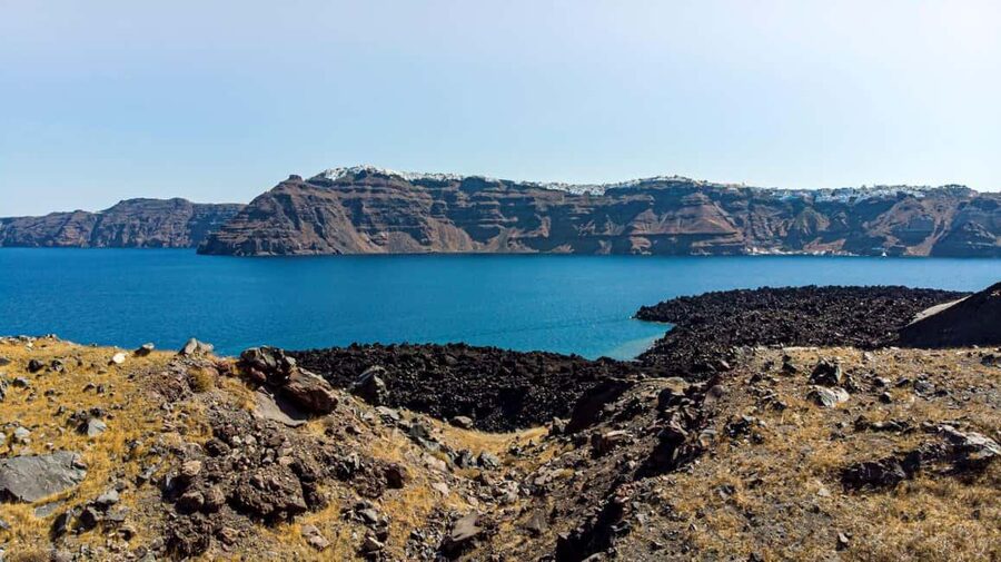Santorini Volcano, Hot Springs Adventure - Pickup, language, and practical details