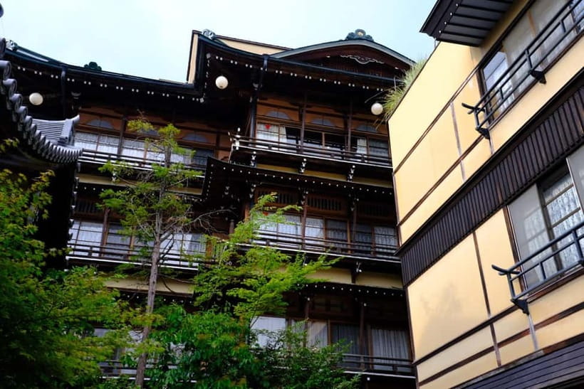 Snow Monkeys & Ghibli Onsen Town with Free Time to Explore - Reaching the snow monkeys at Jigokudani