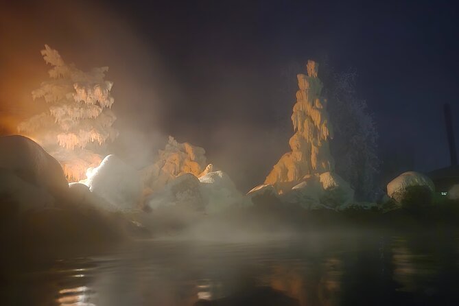 Spectacular Hot Spring Experience with Northern Lights - The hot springs under the winter sky