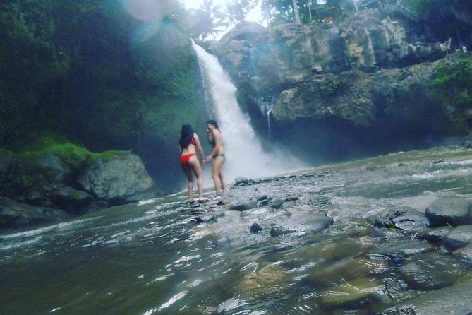 Ubud Hot Springs and Waterfall Private Guided Tour - Tegenungan Waterfall requires stamina