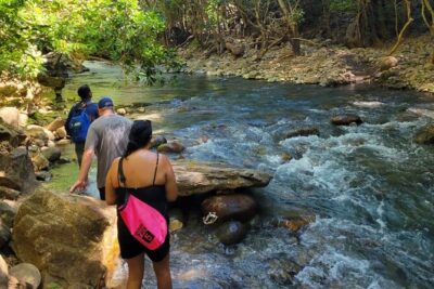 Water Adventure: La Leona Waterfall, River tubing & Cliff jumps